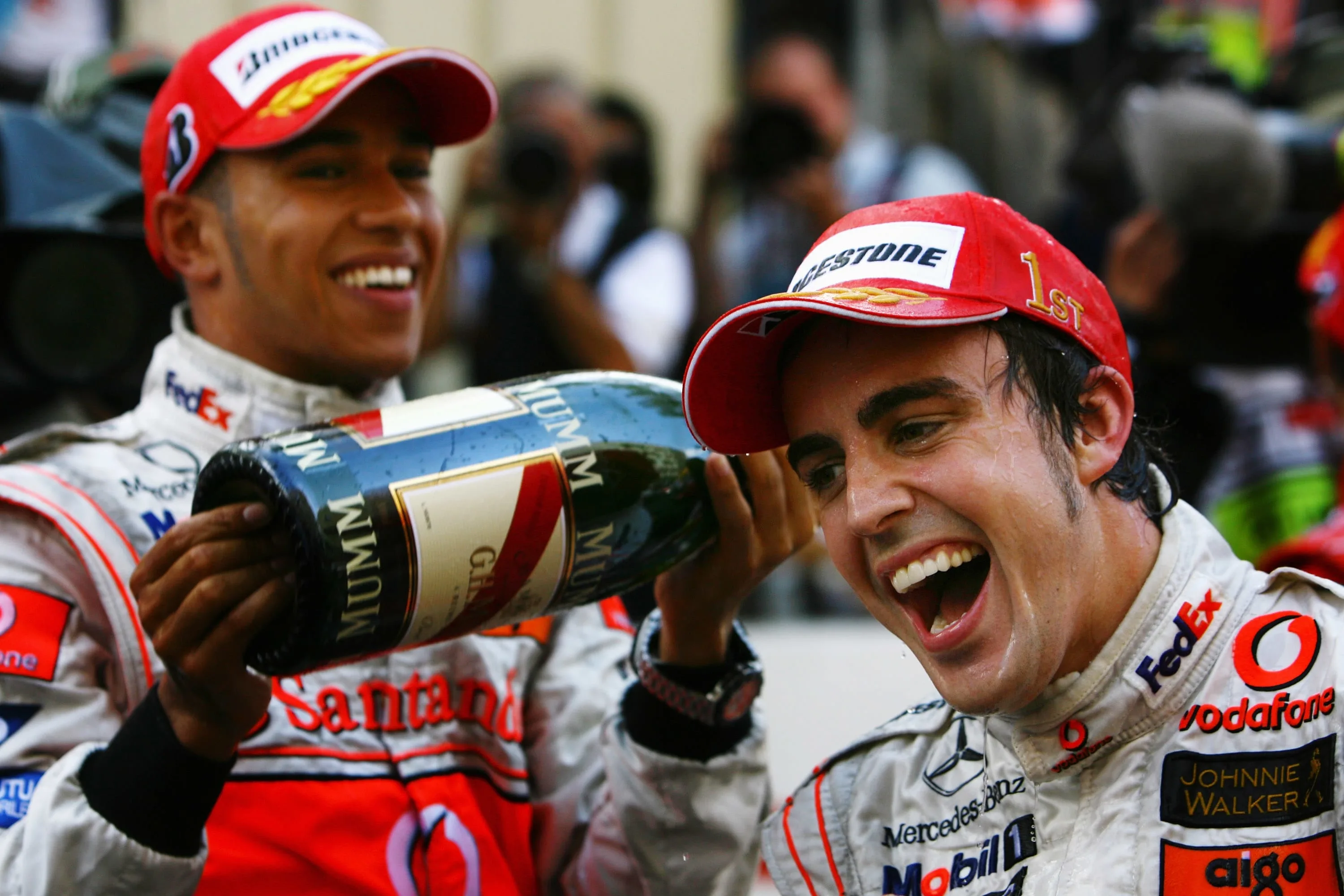 MONTE CARLO, MONACO - MAY 27: Fernando Alonso (R) of Spain and McLaren Mercedes celebrates with